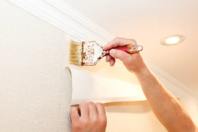 Pose de papier peint à Levet — revêtements muraux et toiles de verre
